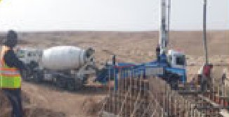 Piling rig and mixer truck on site