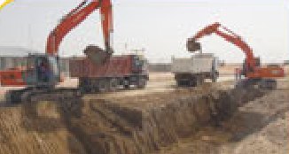 Excavators loading trucks during bulk excavation